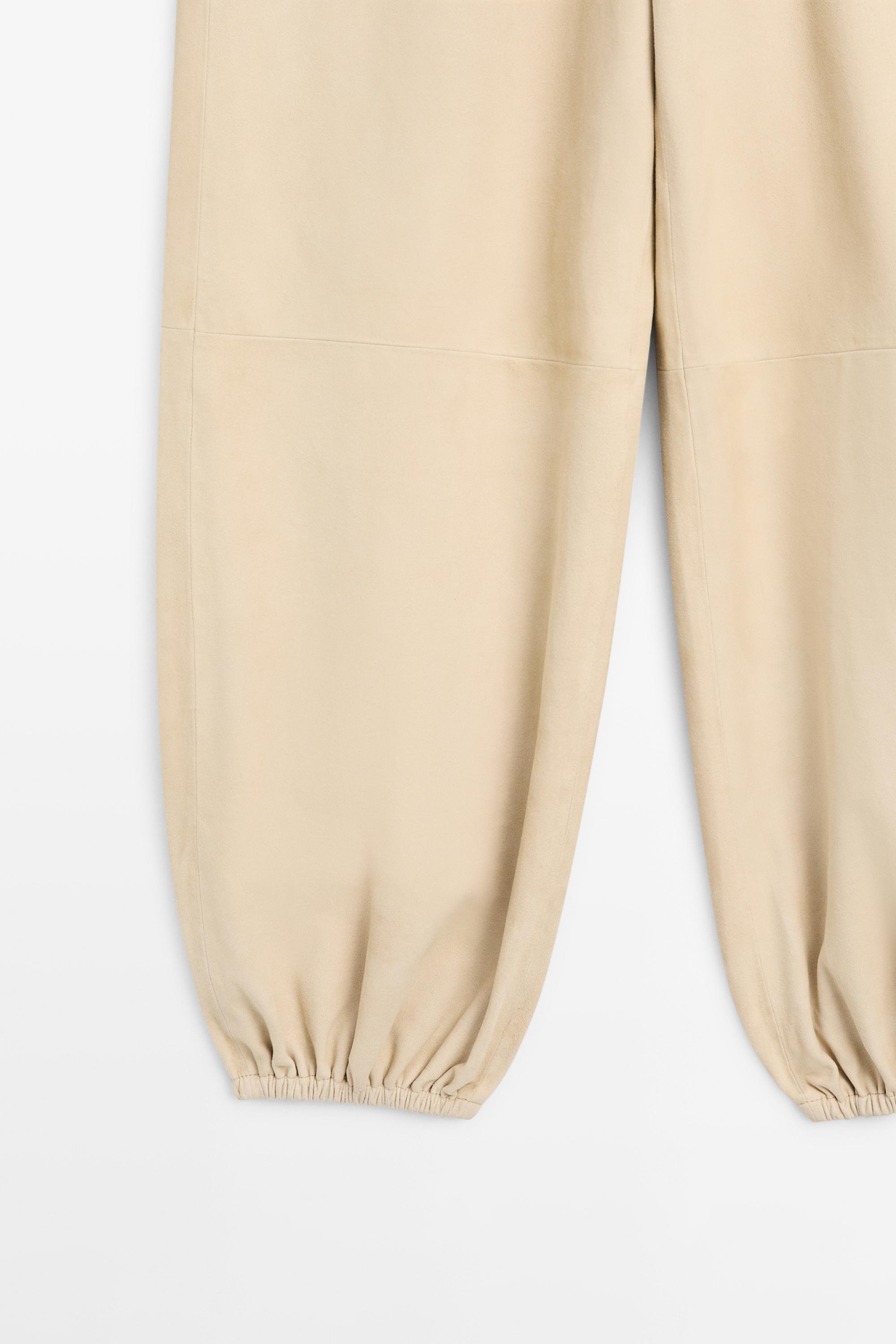 Pantalon bouffant en cuir et daim